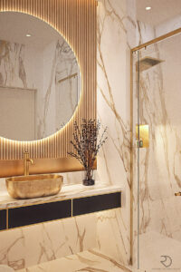 Elegant bathroom interior with marble finishes, round mirror, and gold accents.